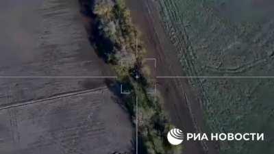 RU pov: Lancet drone hits self-propelled artillery
