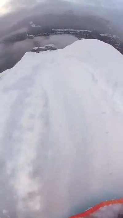 Sledding off a damn cliff..