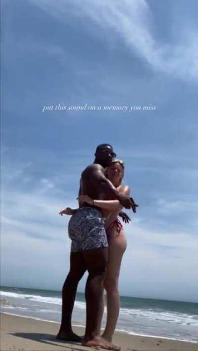 Enjoying each other at the beach