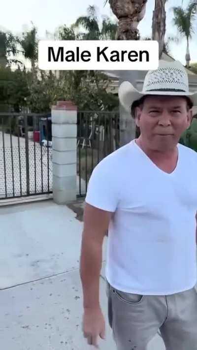 Two men argue on the sidewalk