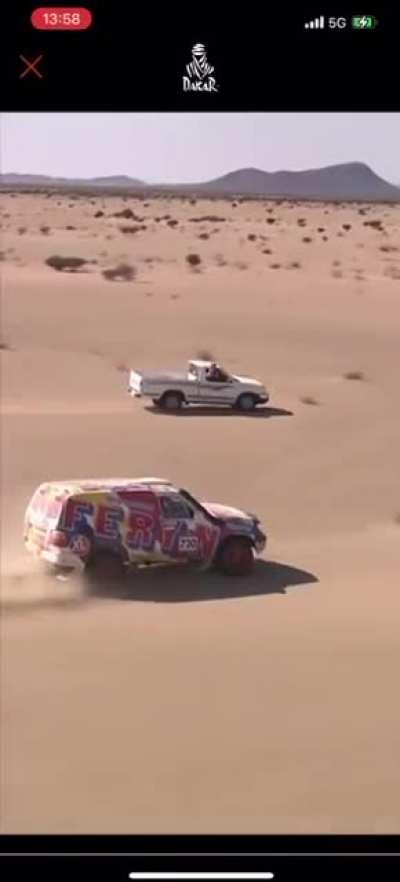 Spending millions on a car for Rally Dakar and this dude shows up