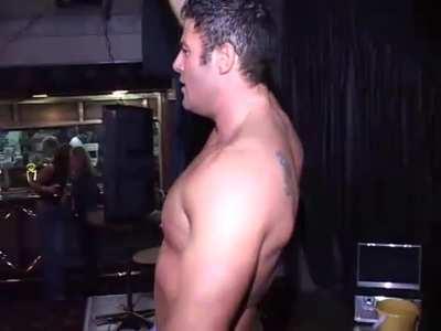 Group of older women watching Andy strip from the side of the stage before he shakes his big cock full of lotion in hottie's face.