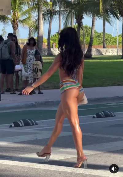 This sexy girl walking down the street
