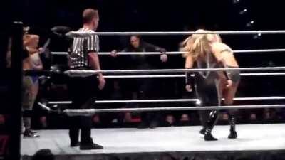 Nattie smacking Charlotte's ass
