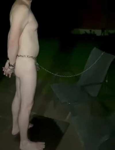 Left him outside naked and blindfolded, wrists behind his back and chained by his chastity cage.