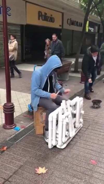 This street performer deserves every penny he gets.