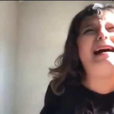 Cutting her own bangs