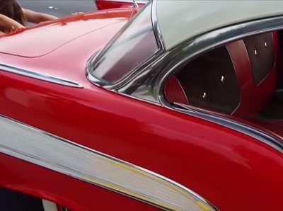 kim and khloe and a car