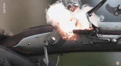 Musket shooting video in slow mo.