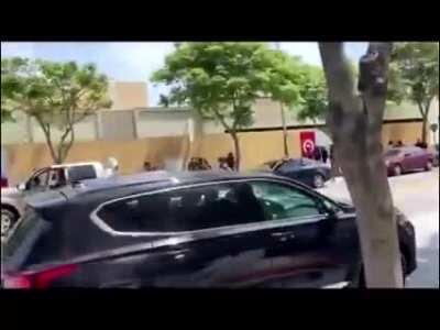 Rioters pulling people from their cars and beating them in Los Angeles