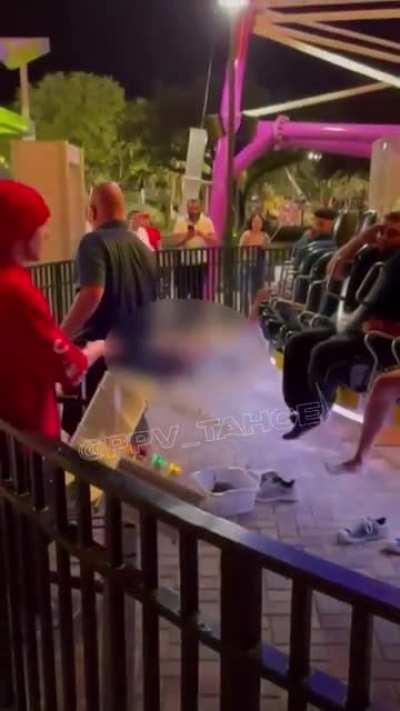 14 Year old boy falls from amusement park ride.