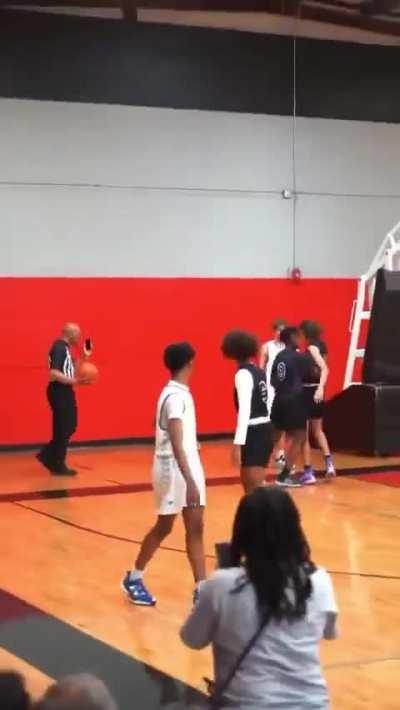 The ref made the wrong call at a high school basketball game.