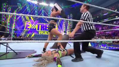 Ronda rousey disrespecting Liv morgan, stepping on her with the championship belt in her hands