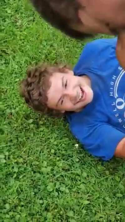 Riding a backyard zipline