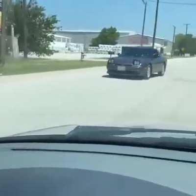 He's pretty skilled for driving backwards and not crashing.