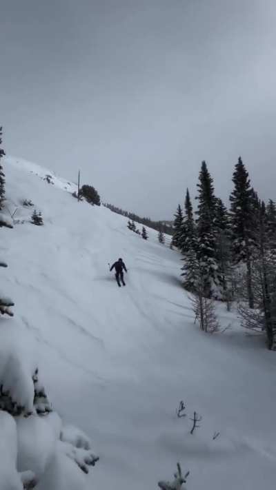 unfortunate skier does a jump next too a lift