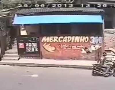 Just another day with two guys on a bike shopping on a local grocery store