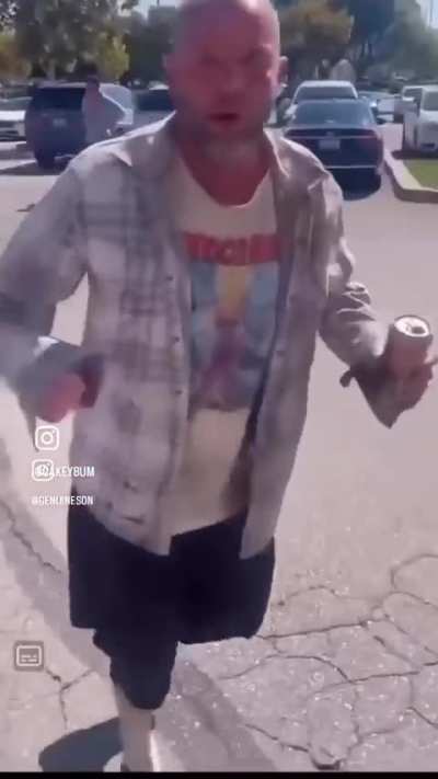 Drunk guy messes with camera man with iron fists