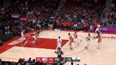 [Highlight] Trae Young banks in the logo three to give him a career high 56 points in the loss