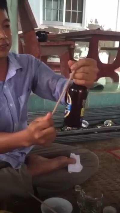 Inefficient way to open a beer