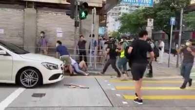 Video of Protesters being violently taken down by police officers in plain clothes. Excessive force used in broad daylight. Disgusting.