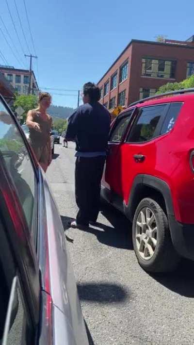 A white woman asking a Native to go back to his “own” country, over a car dispute. And then starts playing the victim right after she sees the camera!