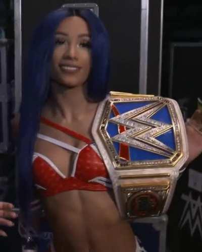 Sasha Banks flaunting her abs