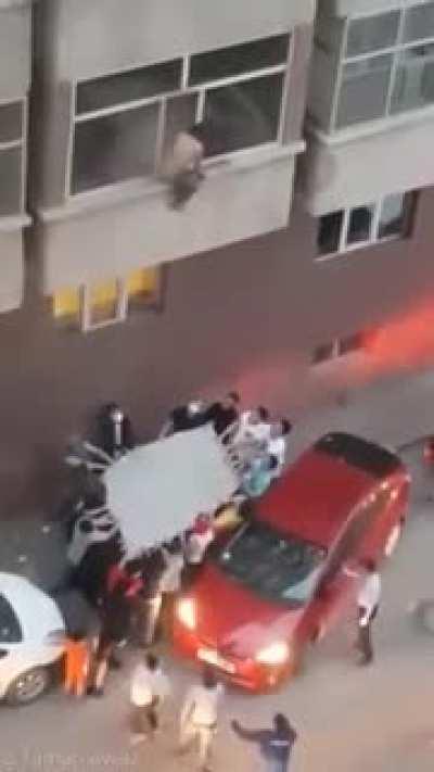 Group saves a man from burning apartment.