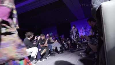 Walking naked through the audience