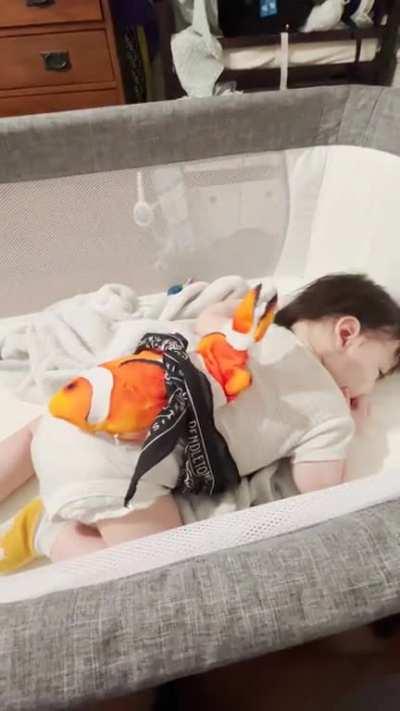 Cat toy makes for great back patting to put baby down!!!