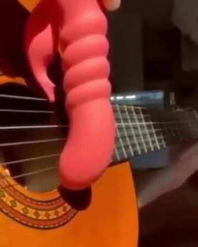 Misirlou with a vibrator on a guitar