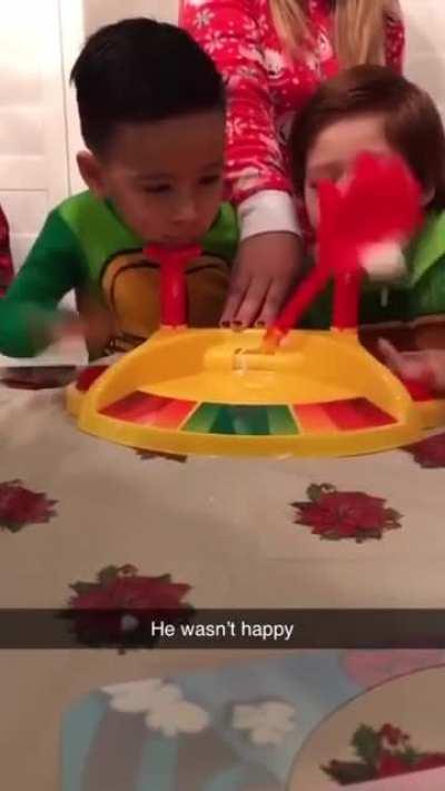 kid loses to it after being beaten in a game