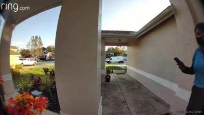 Trashy employee steals packages while being caught on camera.