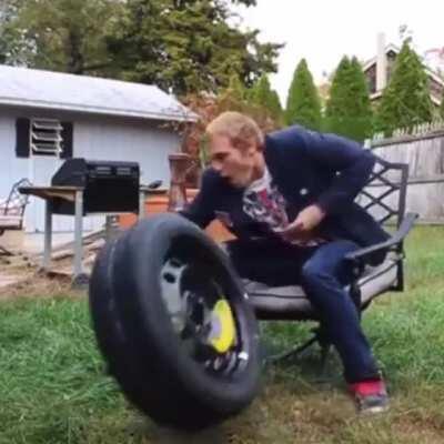 Guy tried to catch that tyre and broke his hand