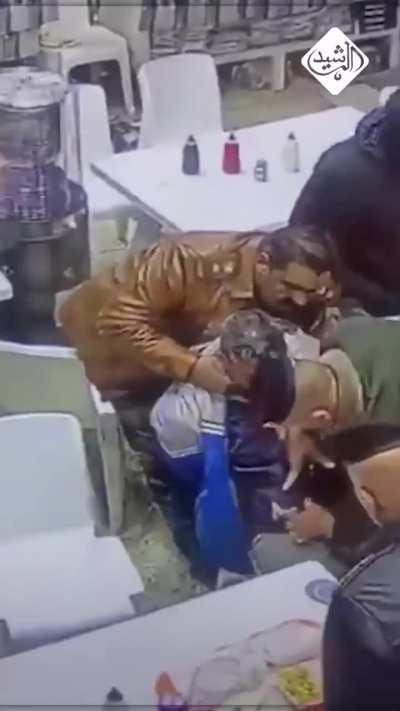 Guy is suspected of having a bomb vest in a restaurant in iraq