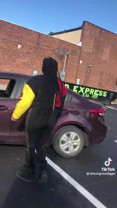 Woman completely tripping/assaulting on man because of a car accident