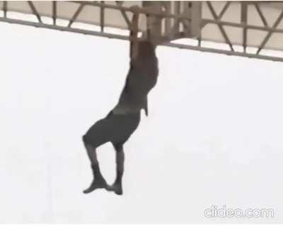 After throwing his microphone up, the cable got tangled in the stage structure, Eddie Vedder, lead singer of the band Pearl Jam, decided to climb the structure without protection and then climbed down the microphone cable.