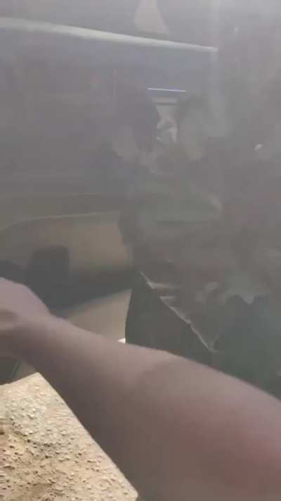 Myanmar(Burma), Muse. Pro-Military Government militias having an argument which leads to a gun battle.