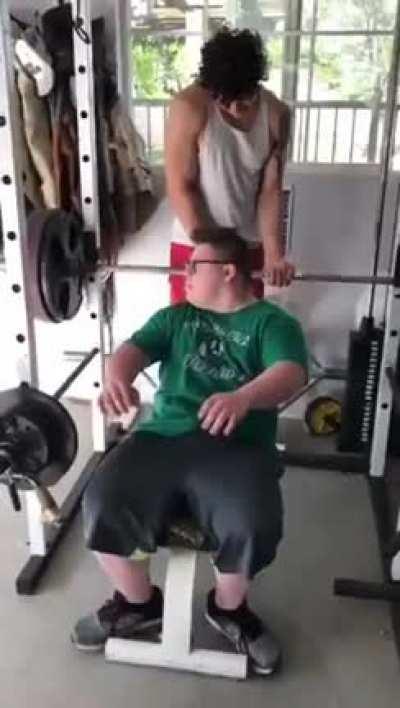 Garret, who has Down Syndrome, bench pressed a school record 355 pounds