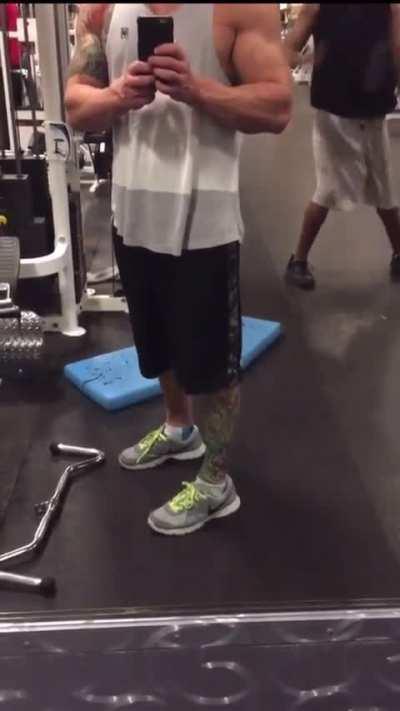 Dude recording his amazing tattoo