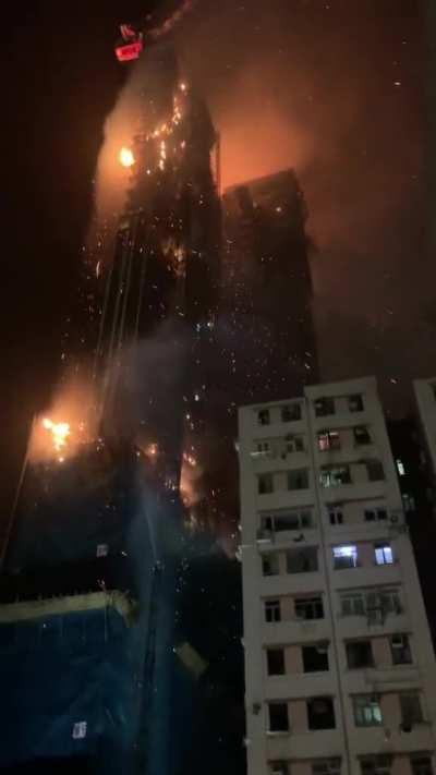Under-construction skyscraper on fire