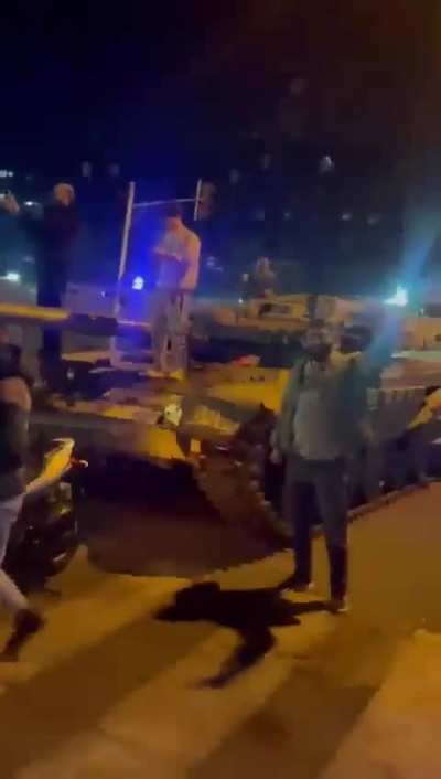 Syrian citizens celebrate on abandoned SAA armor in the heart of Damascus 