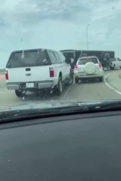SUV wanted to pass Truck on the shoulder, doesnt end too well. Edmonton, Alberta