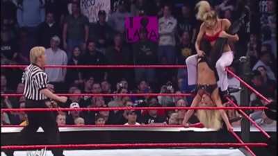 Stacy trying to remove Trish Stratus’s tights among others! 