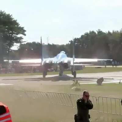 The jet blast from a Su-27 is no joke.