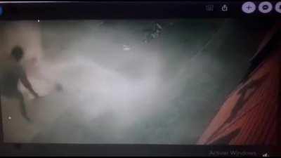 Police shoot tear gas canister at Bolivian protester's face, miss by a few inches and he throws it back at them