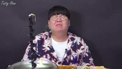 Guy loaded cheese in chocolate fountain machine