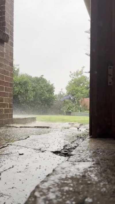 Light summer hailstorm under a tin roof (loud).