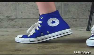 Jenny crushes cheap wearing sneakers.