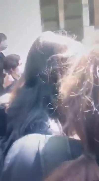 School girls in Iran without their hijabs confront and chase off a director of education. They chant “Bisharaf!” towards the end which is a harsh insult in Persian meaning dishonorable and unethical.